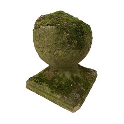 Set of three weathered cast stone gate post finials, circular orb on step-canted square base 