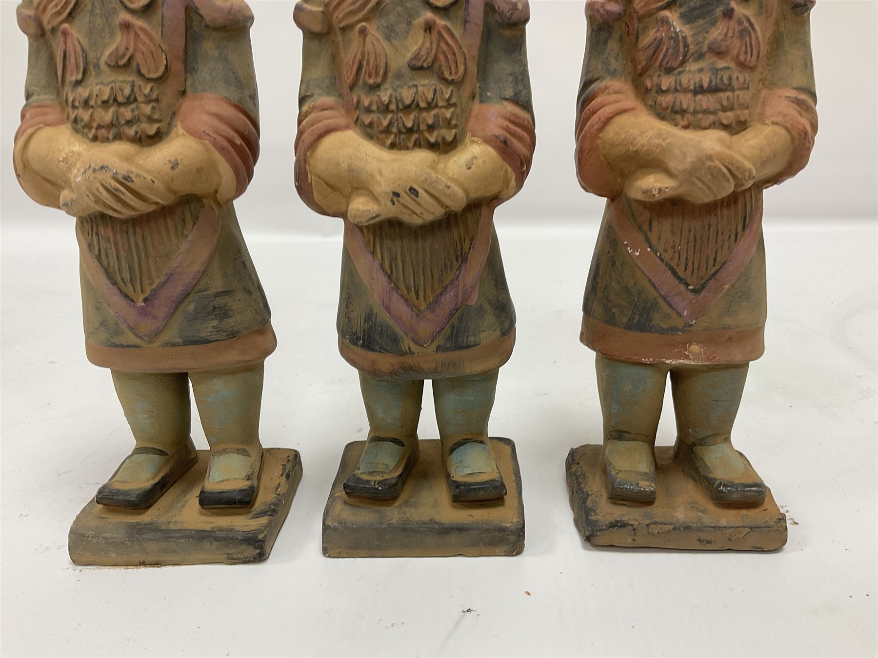 Set of three painted Chinese 'Terracotta Warrior' style figures, H20cm