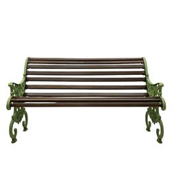 20th century cast iron and wood slatted 'Lilly of the Valley' garden bench, cast iron bench ends of scrolled form decorated with trailing foliage and flower heads, on scrolled supports 