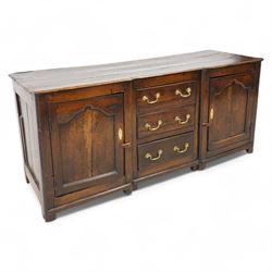 Late 17th to early 18th century oak reverse-breakfront dresser base, the shaped rectangula...