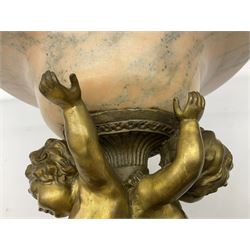 Brass centrepiece modelled as two cherubs supporting a marble bowl, stood upon a foliate design base, H32cm