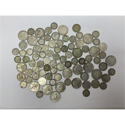 Approximately 260 grams of Great British pre 1947 silver coins, including one shillings, sixpences and threepence pieces 