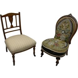 Early 20th century mahogany side chair, detailed marquetry frame, backrest with central urn motif and scrollwork inlay, arched crest rail with floral designs, cream and gold patterned fabric seat, turned front legs with brass castors (H78cm); Victorian walnut nursing chair, carved crest rail, floral needlepoint tapestry upholstery, turned front legs with ceramic castors (H81cm)