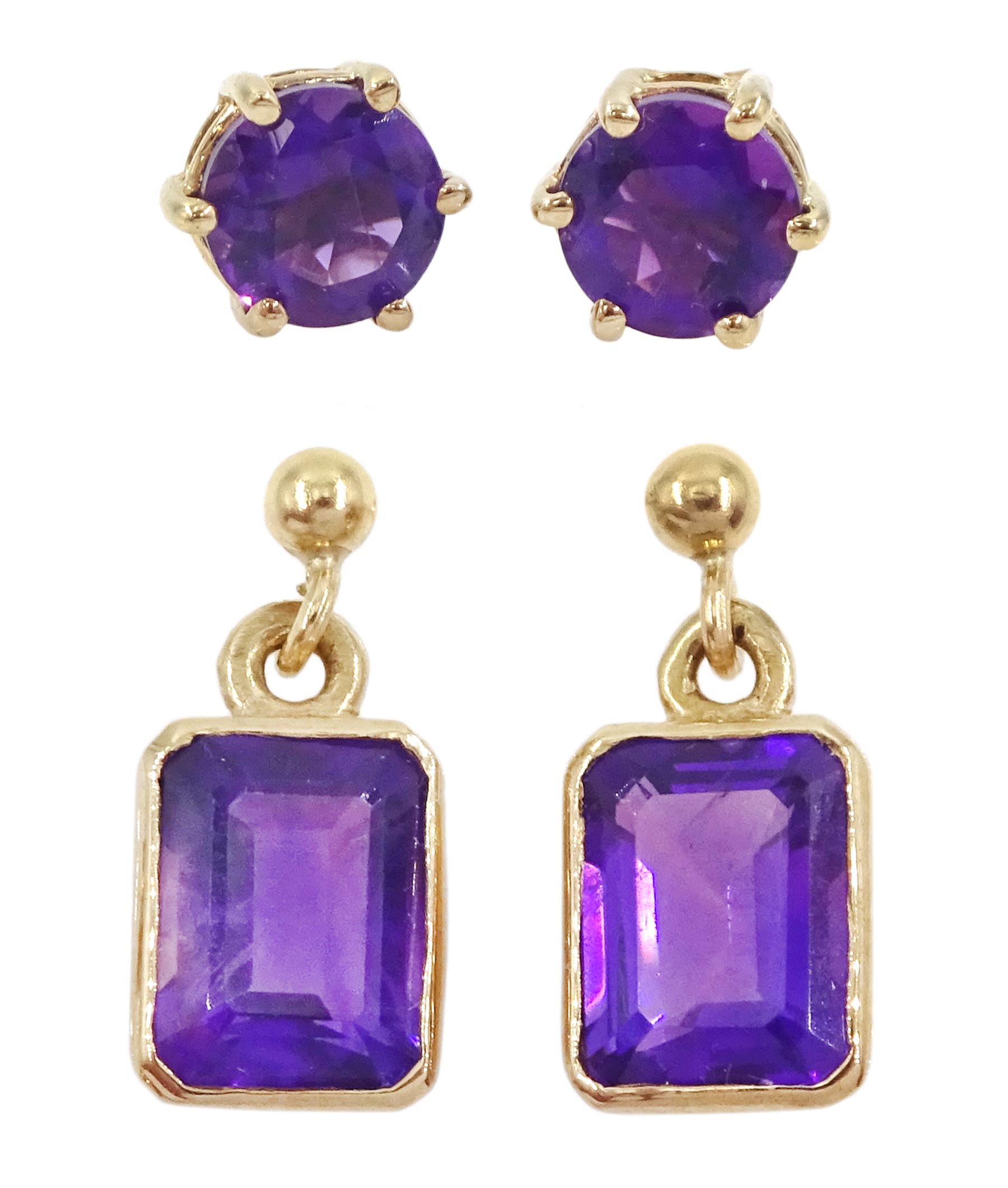 Two pairs of 9ct gold amethyst stud earrings, both hallmarked