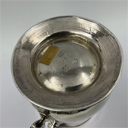 George II silver tankard, of waisted baluster form with acanthus capped C scroll handle, the body engraved with a lion rampant, upon a circular spreading foot, hallmarked Gabriel Sleath & Francis Crump, London 1754, H13cm