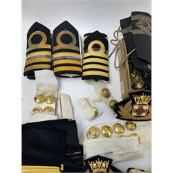 Royal Navy Lieutenant's Frock Coat by Haycock and Jarman, together with other naval accessories, including four pairs of Captain's insignia, six pairs of Captain's shoulder boards, a Merchant Navy cap badge and a collection of other badges, buttons and shoulder boards 