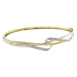 9ct white and yellow gold diamond twist hinged bangle, hallmarked