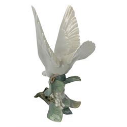 Seven Lladro figures including group of two doves, rooster, boy with accordion, deer, dove in flight , two geese and two Nao figures