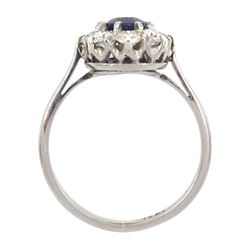 Platinum oval cut sapphire and transitional cut diamond cluster ring, stamped Plat, sapphire approx 0.70 carat, total diamond weight approx 0.80 carat