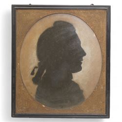 Early 19th century oval pastel silhouette, head and shoulders of a young gentleman, in ori...