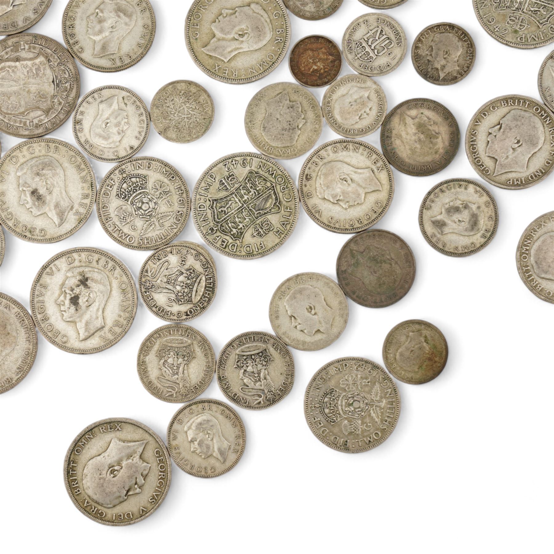 Approximately 610 grams of Great British pre 1947 silver coins, including sixpences, shillings, two shillings, halfcrowns etc