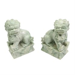 Pair of Chinese carved green stone temple lions, H17cm 