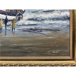 Robert Sheader (British 20th Century): Lifeboat on Scarborough Shores, oil on board signed 39cm x 49cm
