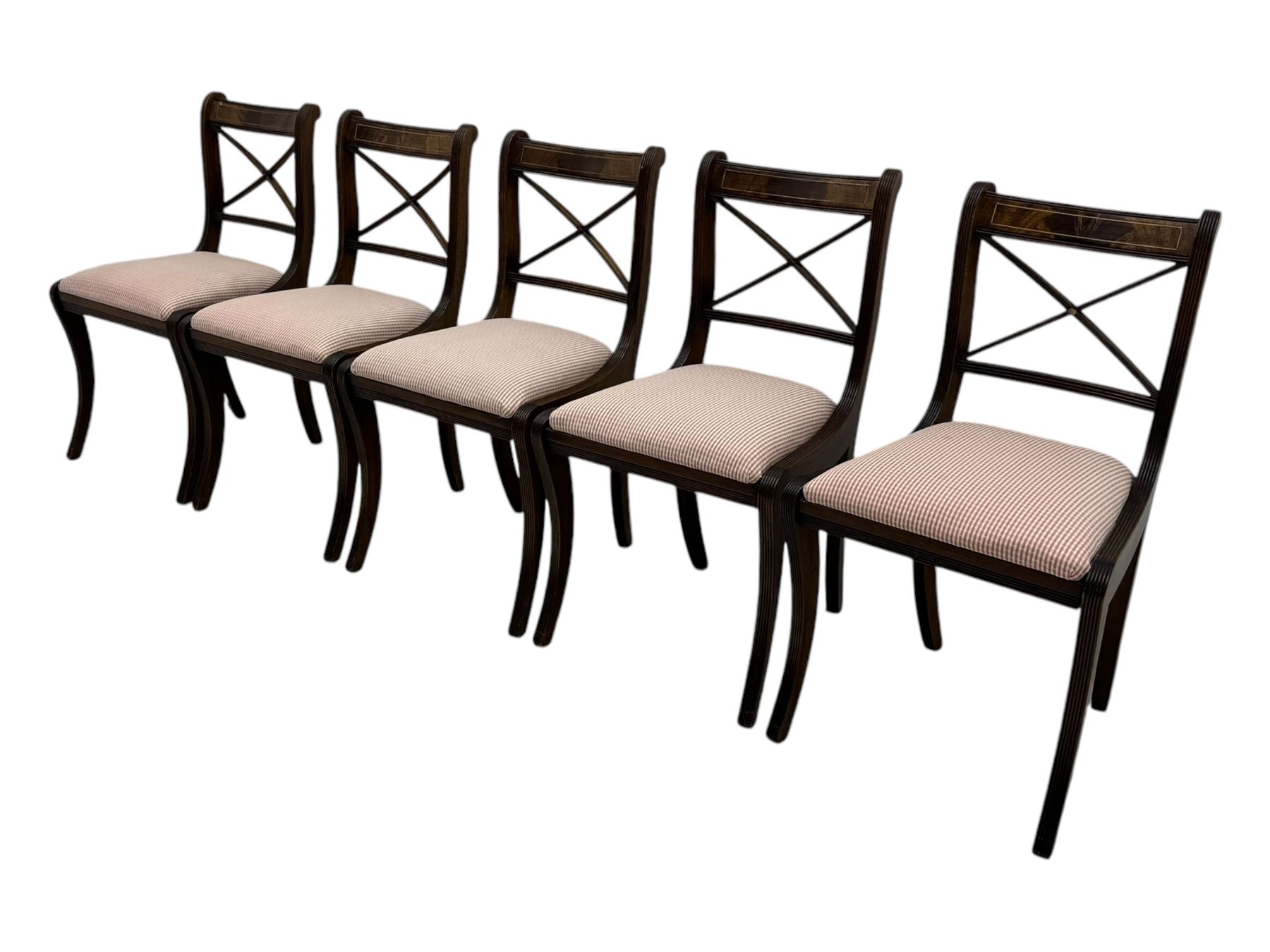 Set of ten (8+2) Regency design mahogany and brass inlaid dining chairs, bar cresting rail over x-framed back, upholstered drop-in seats, moulded frame and sabre supports 