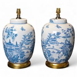 Pair of lamps of baluster form, decorated with a Japanese landscape on a white ground rais...