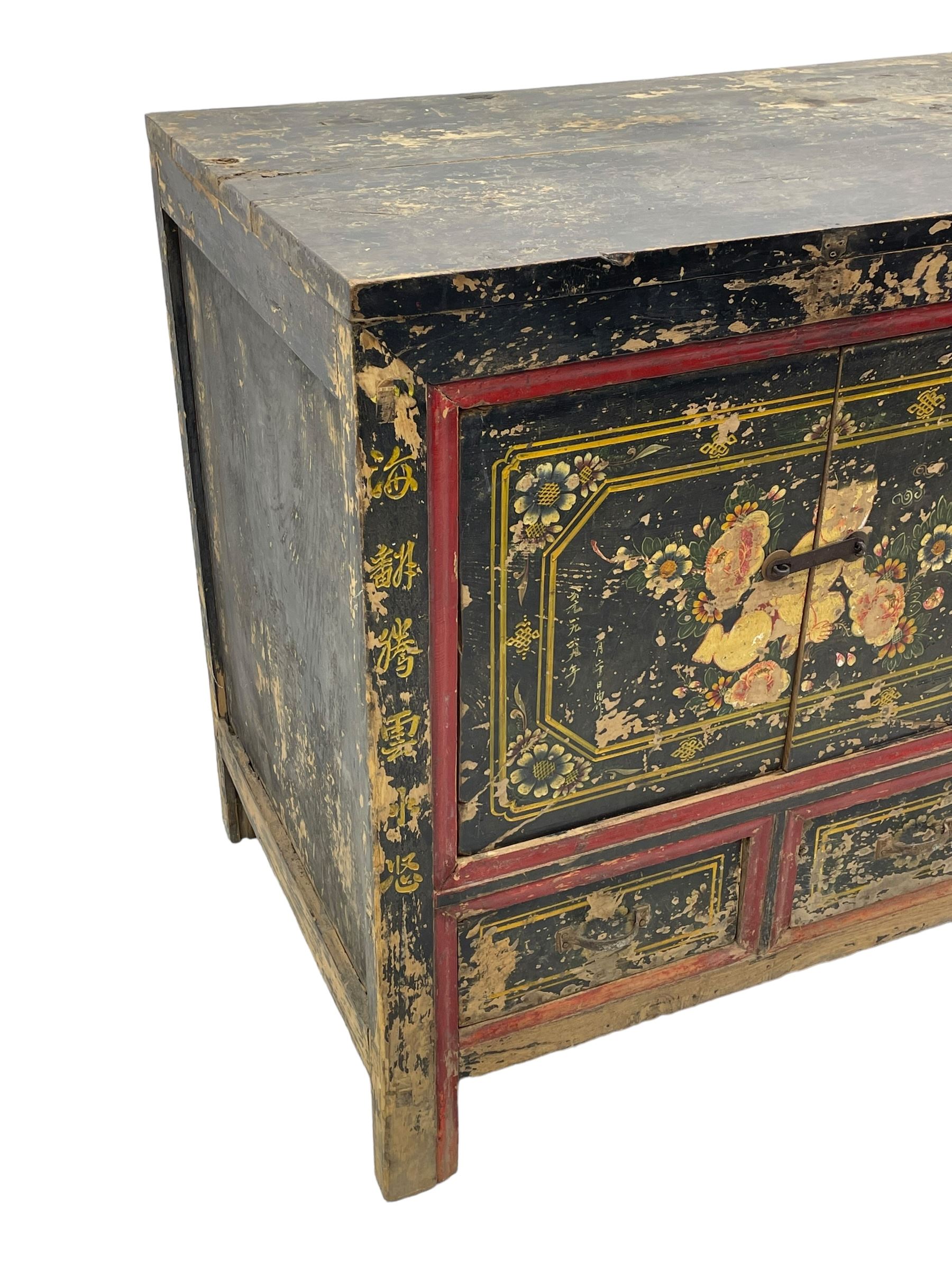 19th century Chinese Qing dynasty painted elm cupboard, Shanxi province, two double cupboards enclosed by doors painted with figure and flower heads, fitted with four small drawer, on stile supports 