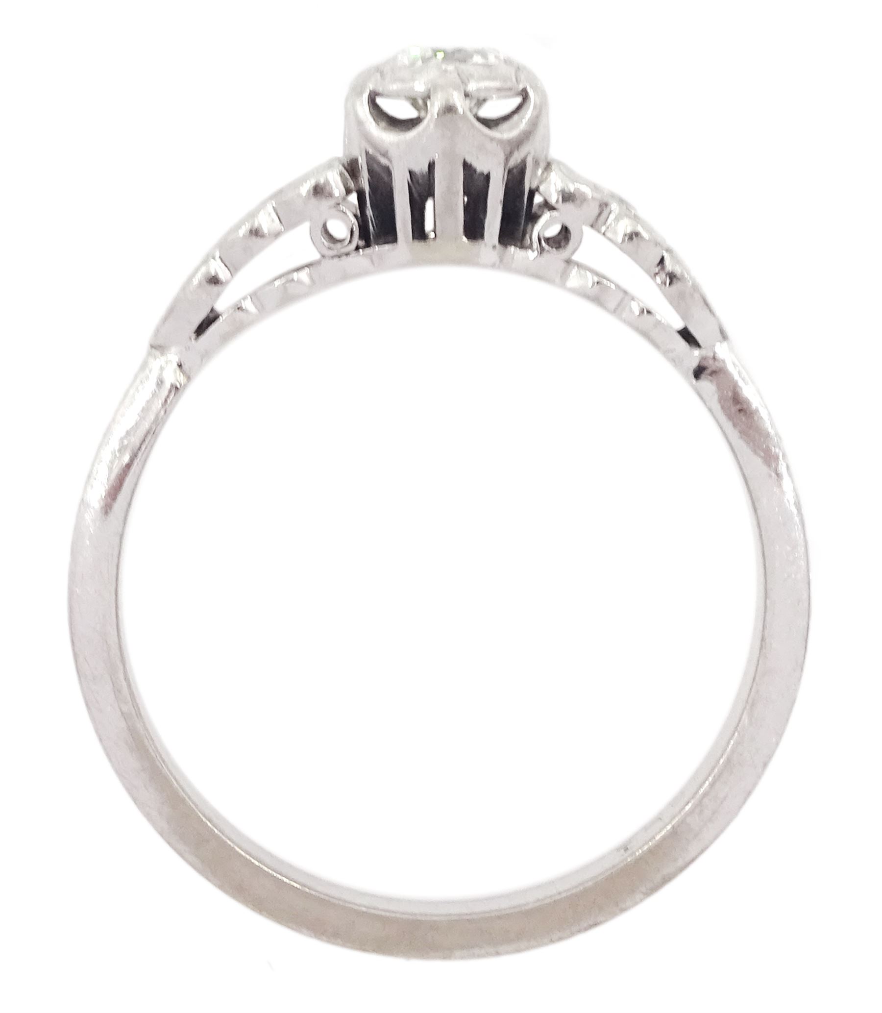 18ct white gold single stone round brilliant cut diamond ring, with diamond set shoulders in flower head setting, total diamond weight approx 0.25 carat