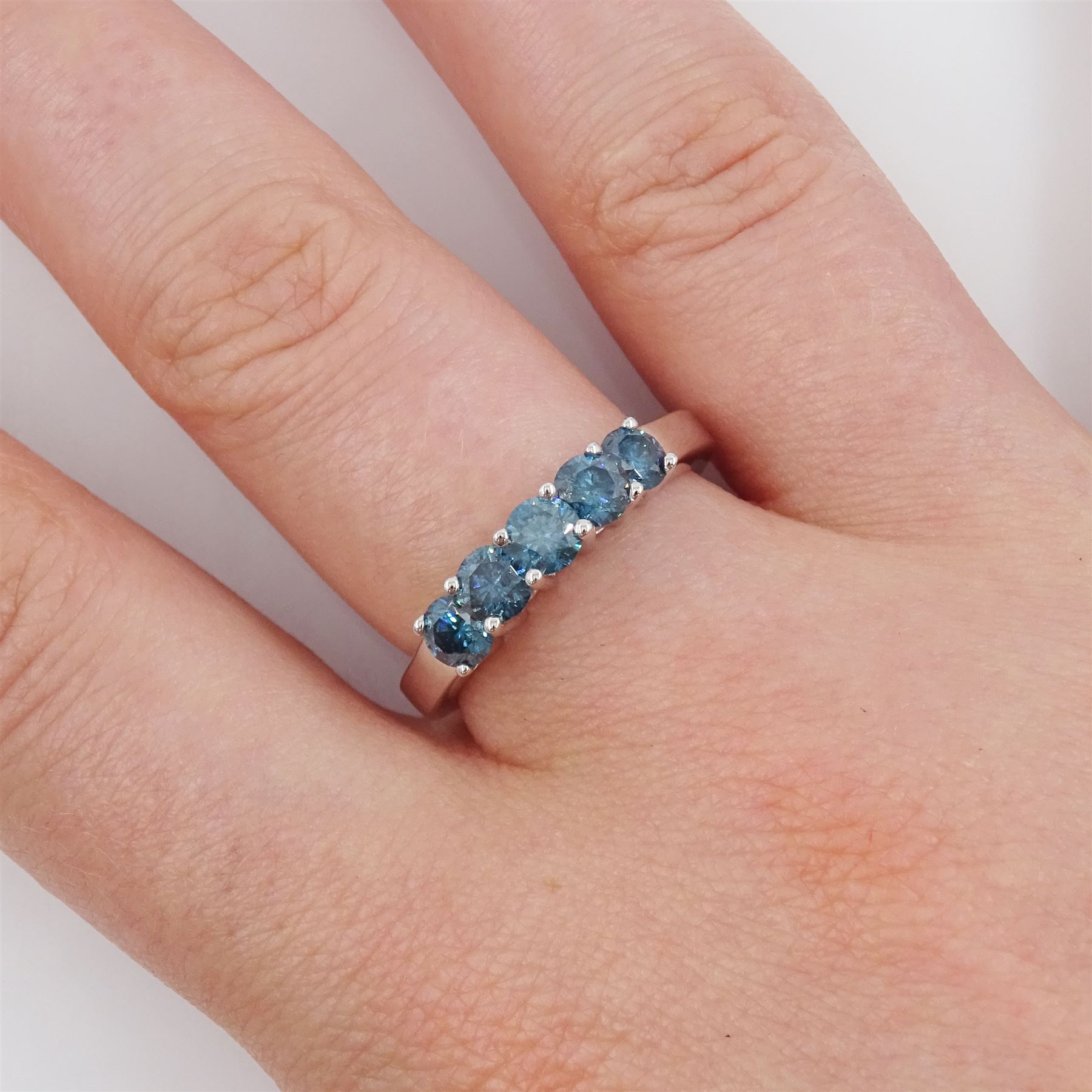 14ct white gold five stone round brilliant cut fancy blue diamond ring, stamped 14K, total diamond weight approx 1.00 carat 