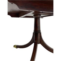 Georgian design inlaid chestnut wood centre table, the circular tilt-top inlaid with satinwood banding, gun barrel turned pedestal on four out-splayed supports, cast brass hairy paw castors, stamped 'P.H.R & Co. Holt, England' 