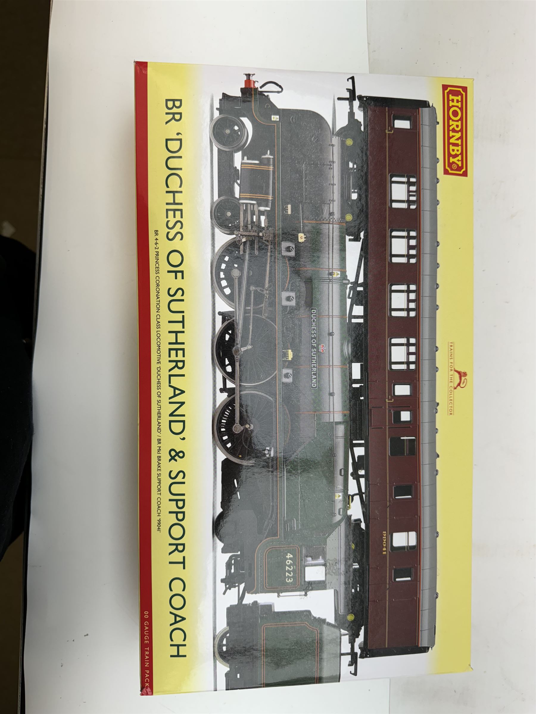 Hornby '00' gauge BR Duchess of Sutherland and Support Coach Train Pack R3221, comprising BR Princess Coronation Class 4-6-2 Duchess of Sutherland locomotive no. 46233 and BR MkI Brake Support Coach no. 99041, both in maroon livery, in original box