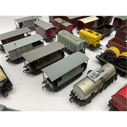 Hornby Dublo - forty-three goods wagons including nine tank wagons (Esso, Mobil, Vacuum, UD and Traffic Services), brake vans, meat and fish wagons, bogie well and bolsters, cable drums, open wagons, salt and grain wagons, etc; and six others by Tri-ang etc; all unboxed (49)