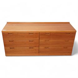 Mid-20th century cherry wood low chest, fitted with six long drawers, on plinth base 