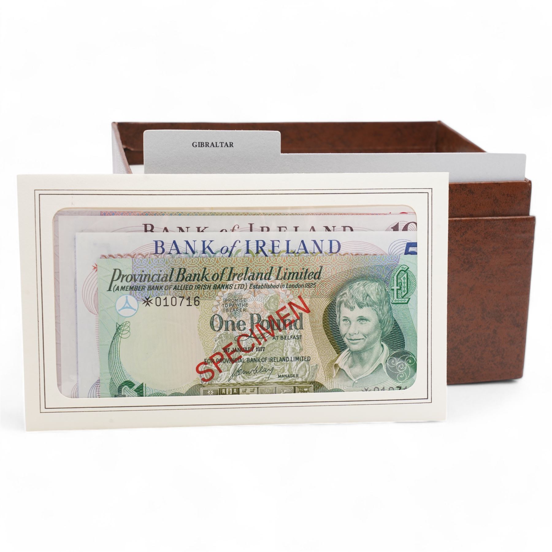 The Franklin Mint 'Specimen Banknotes From Around The World' comprising Gibraltar, Chana, Ireland, Jersey, Tonga, Swaziland,  Mauritius, Bahrain, Dominican Republic, Malta, Philippines, Sierra Leone, Paraguay, Botswana and Solomon Islands, each with certificate of authenticity