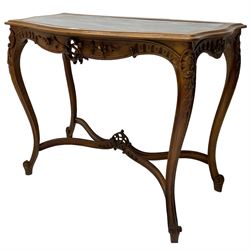 French design walnut console table, shaped top with inset grey marble panel, the frieze pierced and carved with scrolling foliage and applied flower heads, raised on cabriole supports with cartouche carved knees, united by shaped X-stretcher