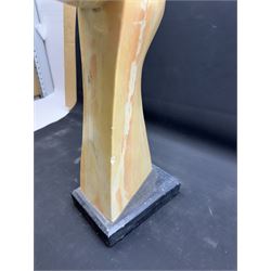 Abstract marble sculpture modelled as a dancer, upon a rectangular base, H58cm