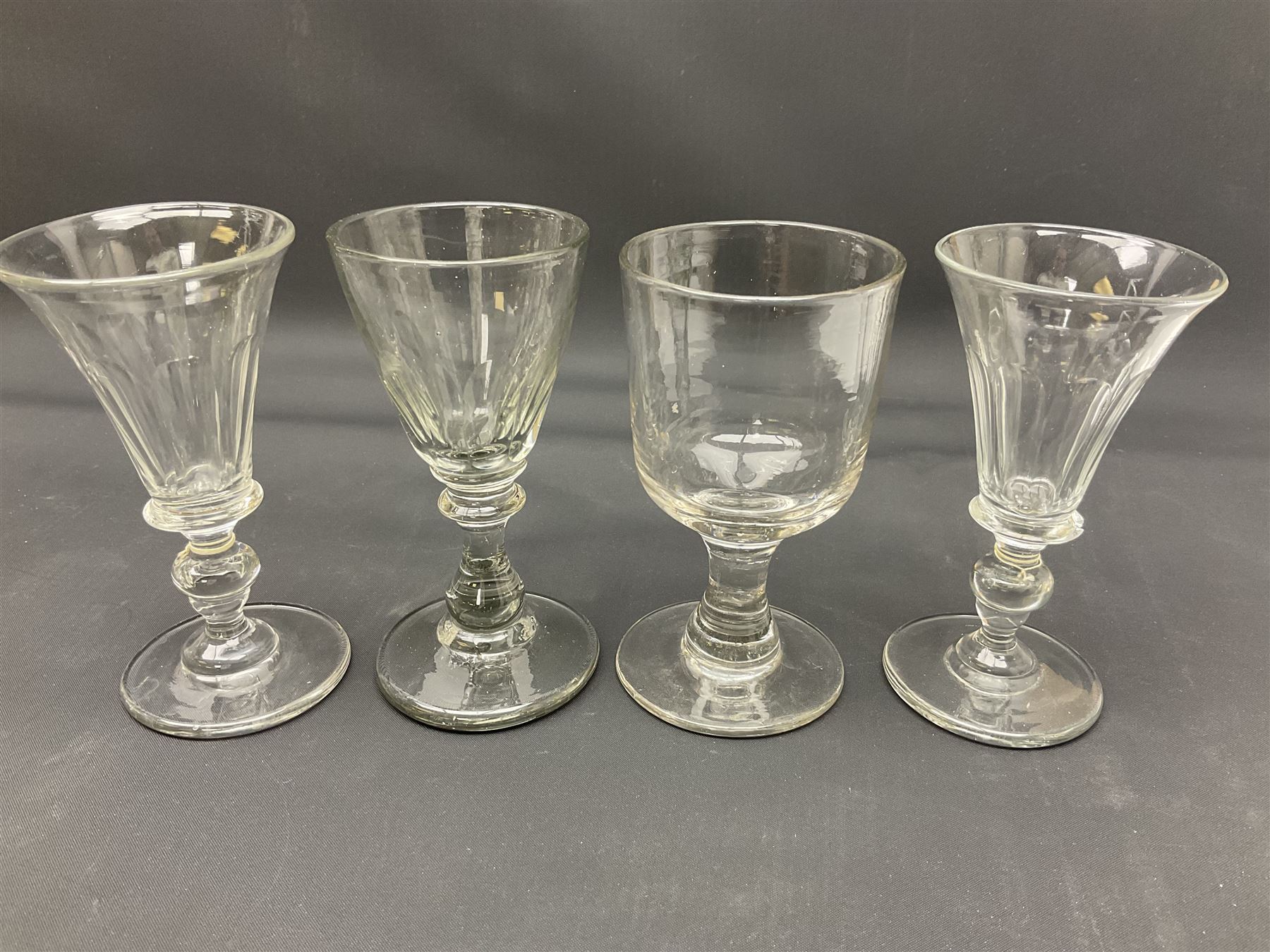 Collection of 18th century and later glassware, including set of three with twist stems and etched and fluted examples