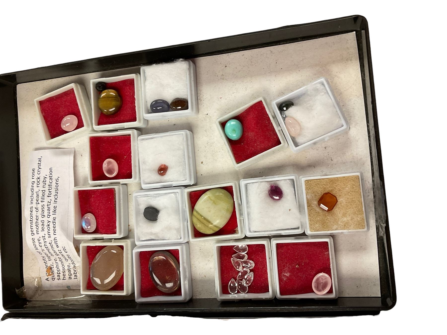 Collection of precious stones including tigers eye, rose quartz, moonstone etc  