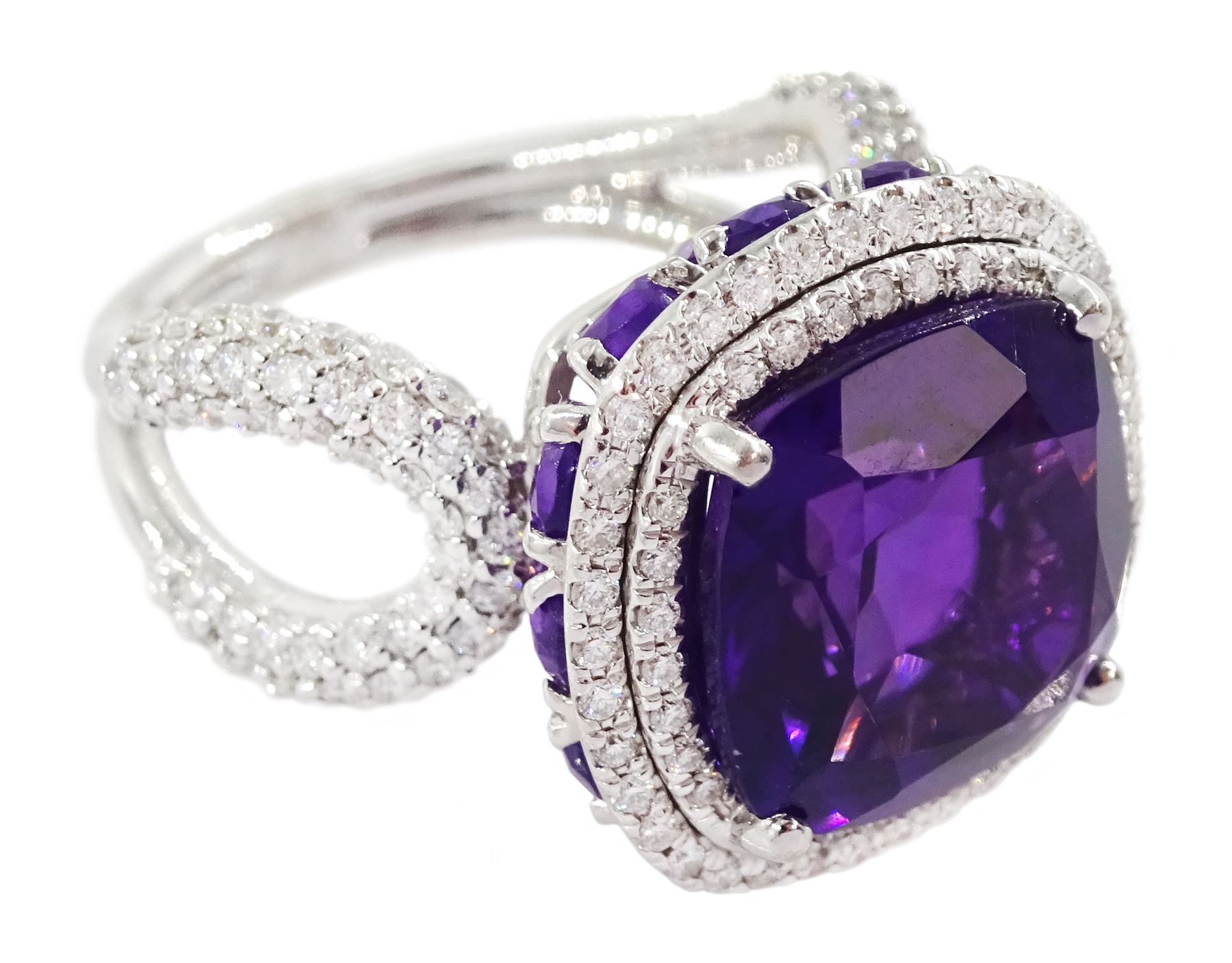 Damas 18ct white gold amethyst and diamond Vera ring, the central square cushion cut amethyst of 6.28 carat, with round brilliant cut diamond surround, pear cut amethyst gallery and diamond set shoulders, total amethyst weight 15.48 carat, total diamond weight 1.10 carat, with certificate