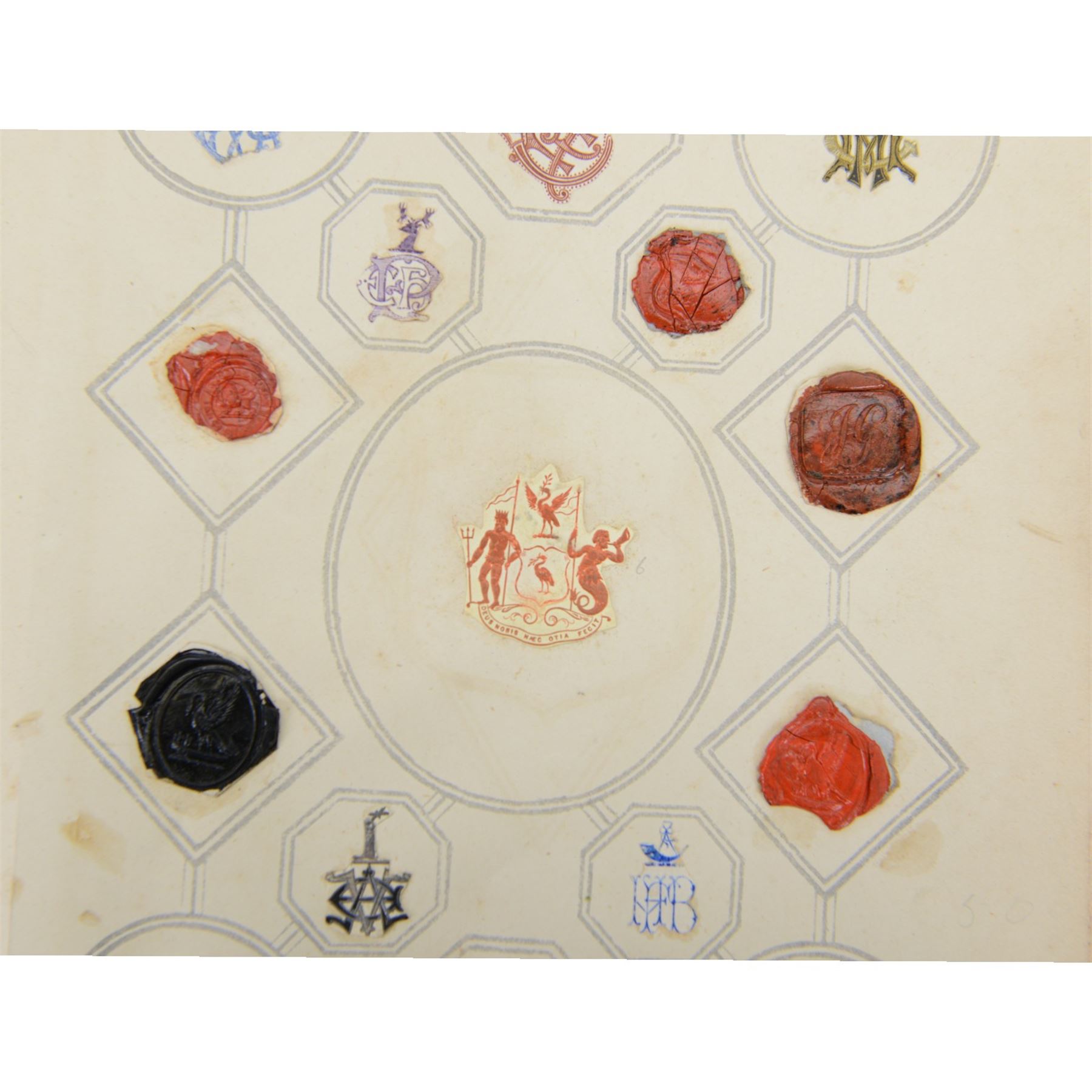 Victorian album of crests and monograms, including examples cut from envelopes and stamped into wax seals, with label to interior front cover reading 'Edward Law's Crest Collection Album 243' 