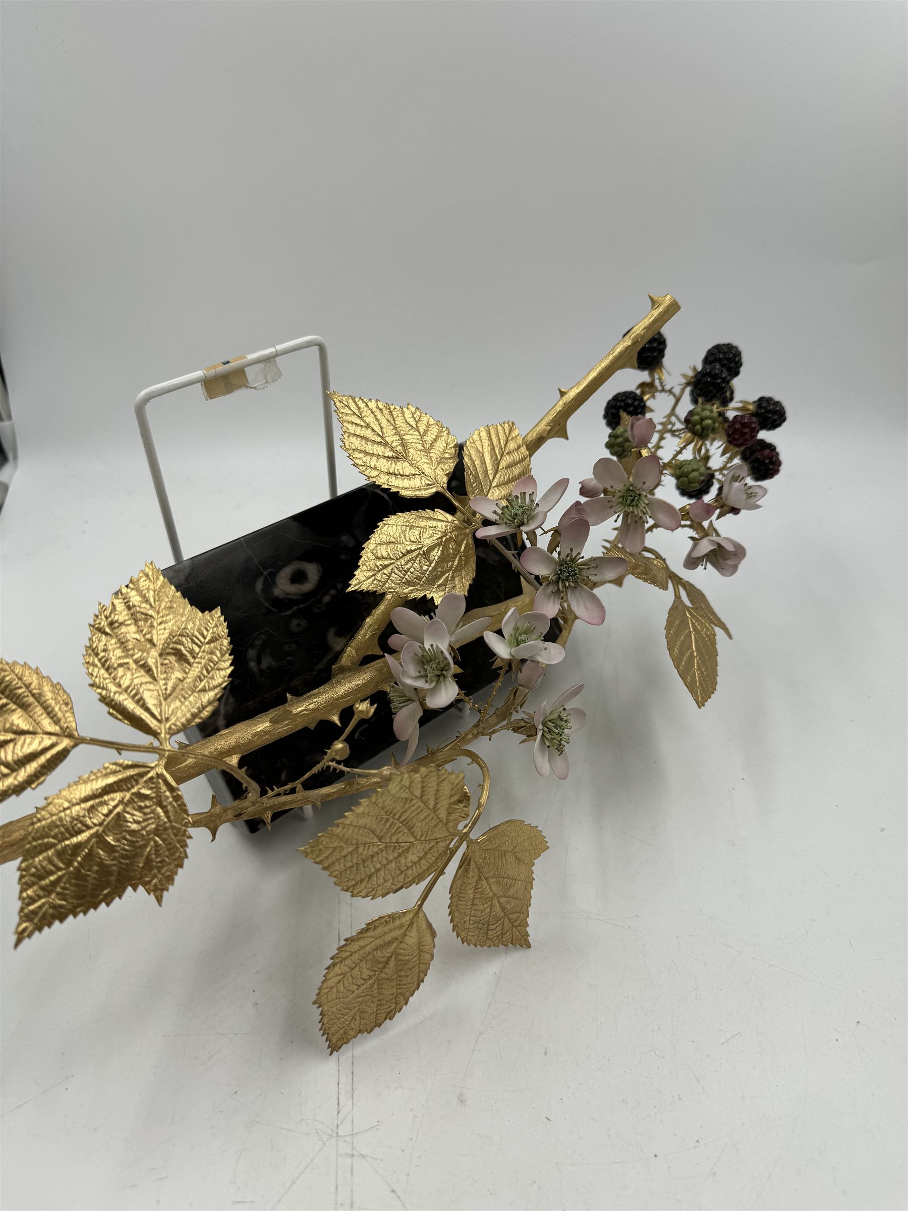 Ruth van Ruyckevelt for St Denis (ex-Royal Worcester) bone china and gilt bronze sculpture of blackberries, upon marble plinth with inset porcelain plaque beneth, code No.A109, overall L39cm