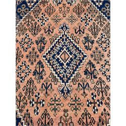 Persian Joshaghan peach and blue ground rug, central stepped lozenge medallion surrounded by bunches of floral motifs, repeating border decorated with stylised plant motifs, within multiple guard stripes