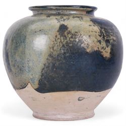 Tang Dynasty style blue-glazed pottery jar or vase, of ovoid form with short lipped rim, the body with cobalt and light blue lustre glaze finishing irregularly above the base, H19cm