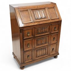 Mid-20th century oak bureau, fitted with fall front above three drawers