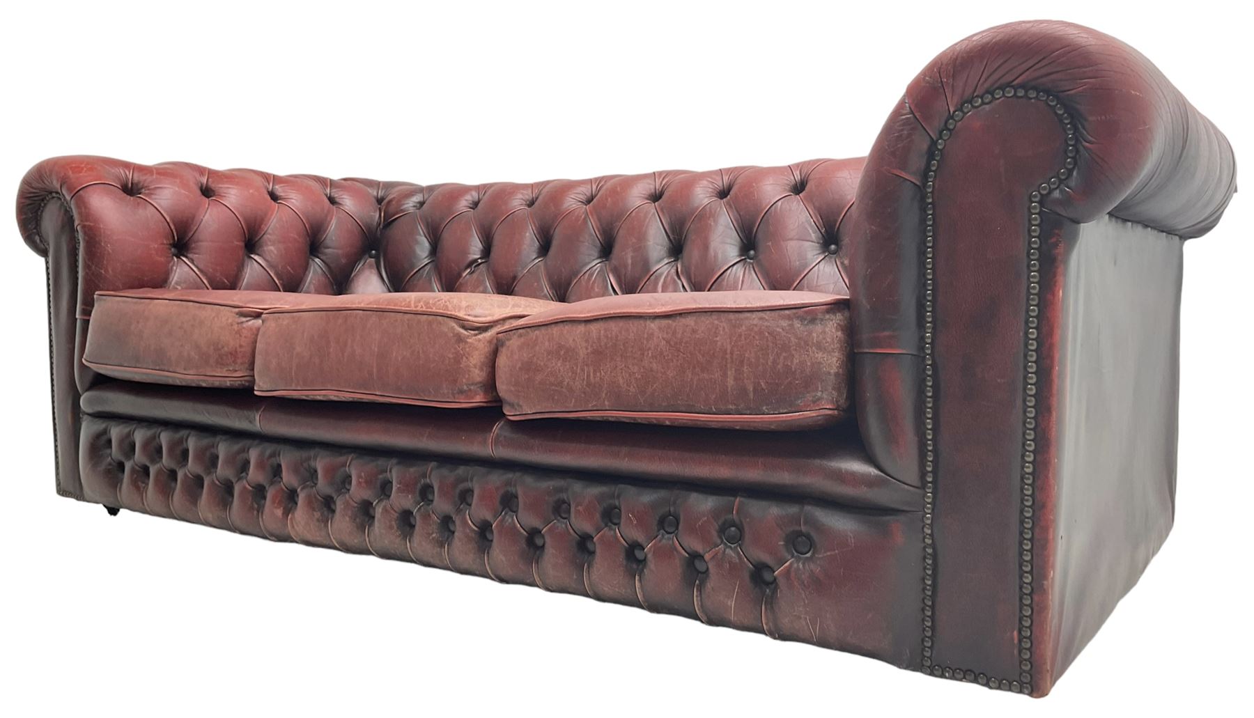 Chesterfield three-seat sofa upholstered in red buttoned leather