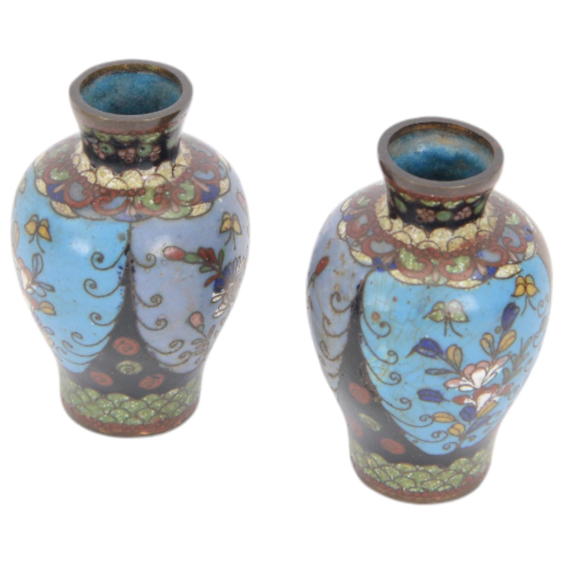 Pair of small Japanese Cloisonne bottle form vases, each decorated with foliate panels against a blue ground, H13cm, a similar pair of Japanese Cloisonne vases and Royal Worcester candle snuffer in the form of a Chinese man holding a fan, H9cm (5)