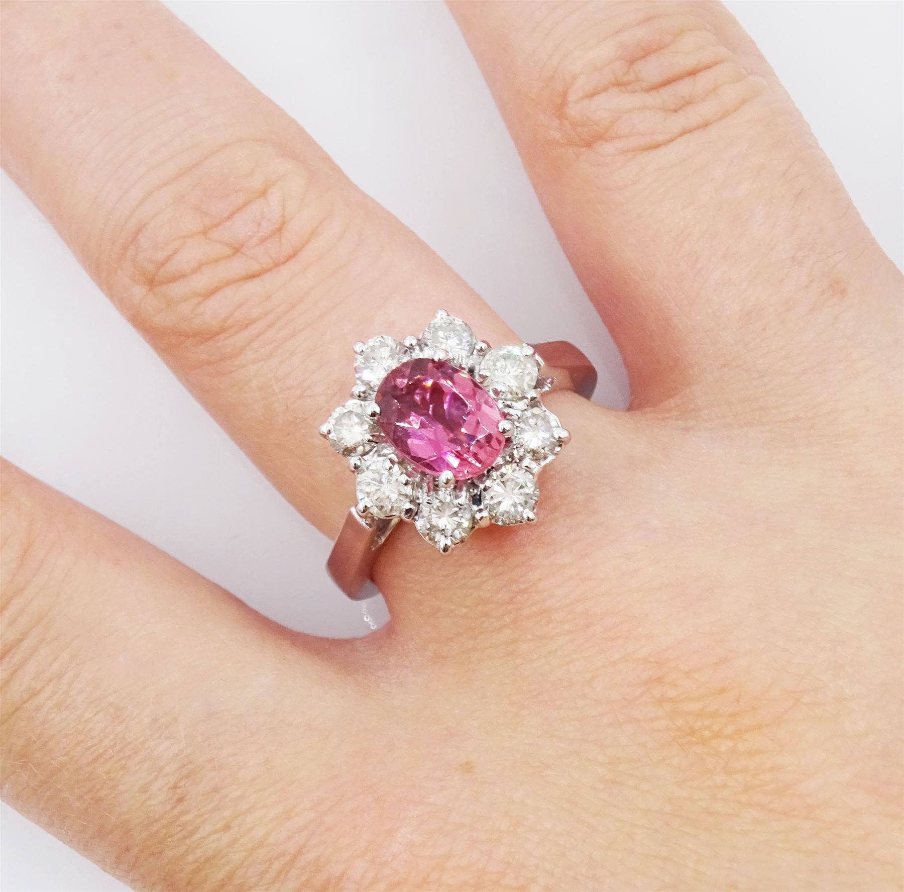 18ct white gold oval pink tourmaline and round brilliant cut diamond cluster ring, hallmarked, tourmaline approx 2.50 carat, total diamond weight approx 0.40 carat