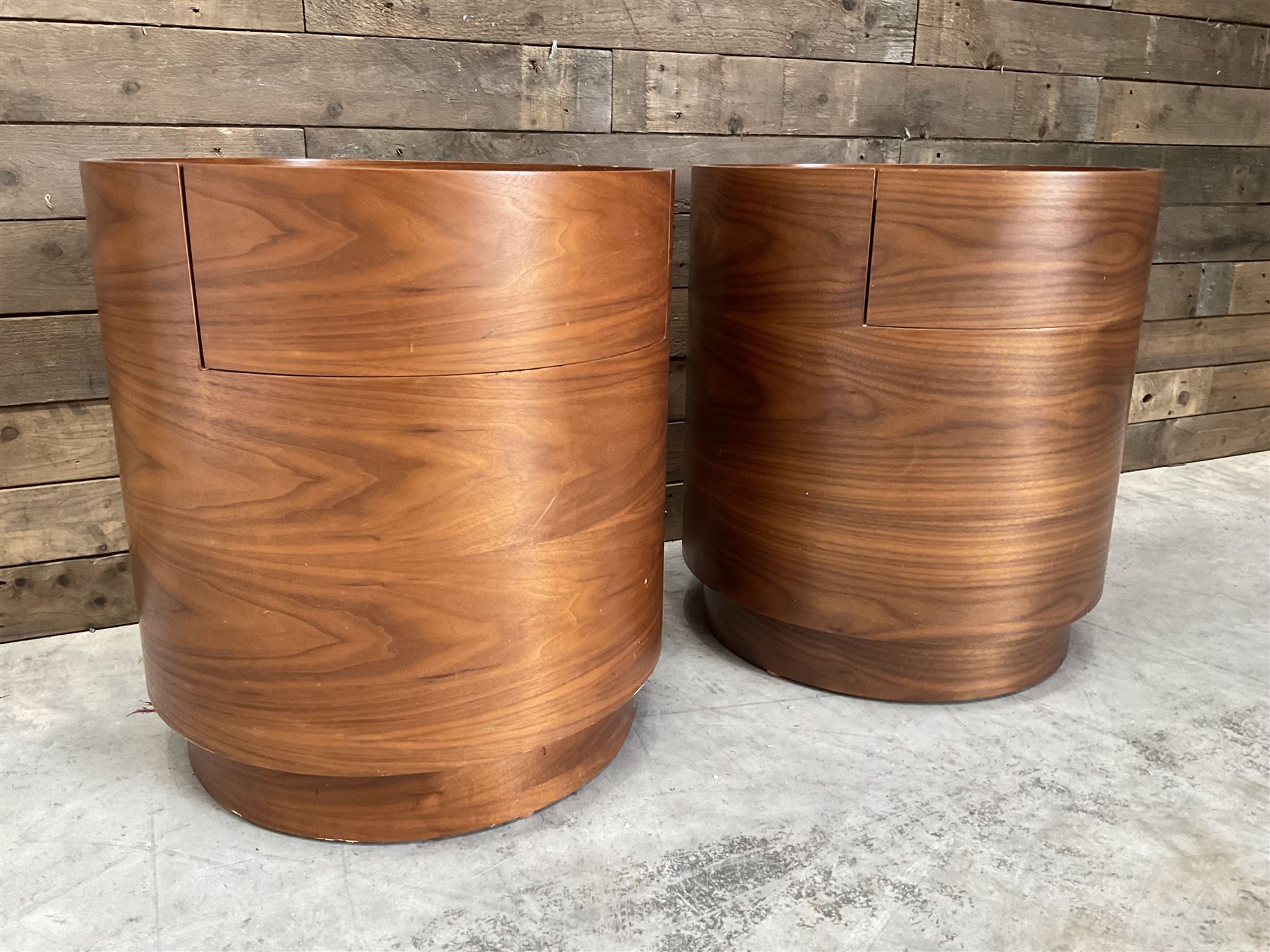 Pair of walnut circular barrel shaped lamp tables, fitted with single drawer