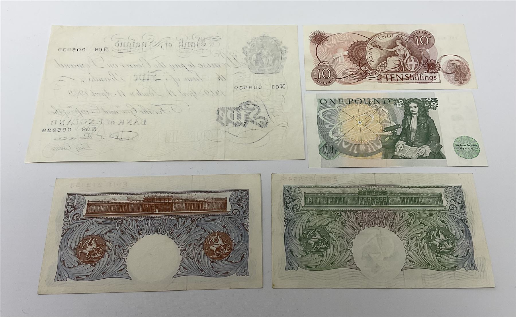 Bank of England Beale white five pound note 'N08' 'London 11 April 1949', Peppiatt emergency issue one pound 'E91E', O'Brien Series A Britannia one pound note 'A52L' and two other banknotes