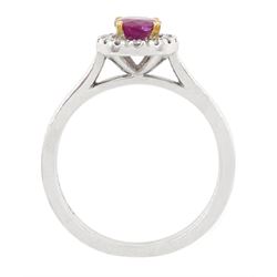 18ct white gold oval cut ruby and round brilliant cut diamond cluster ring, hallmarked, ruby approx 0.85 carat, total diamond weight approx 0.15 carat