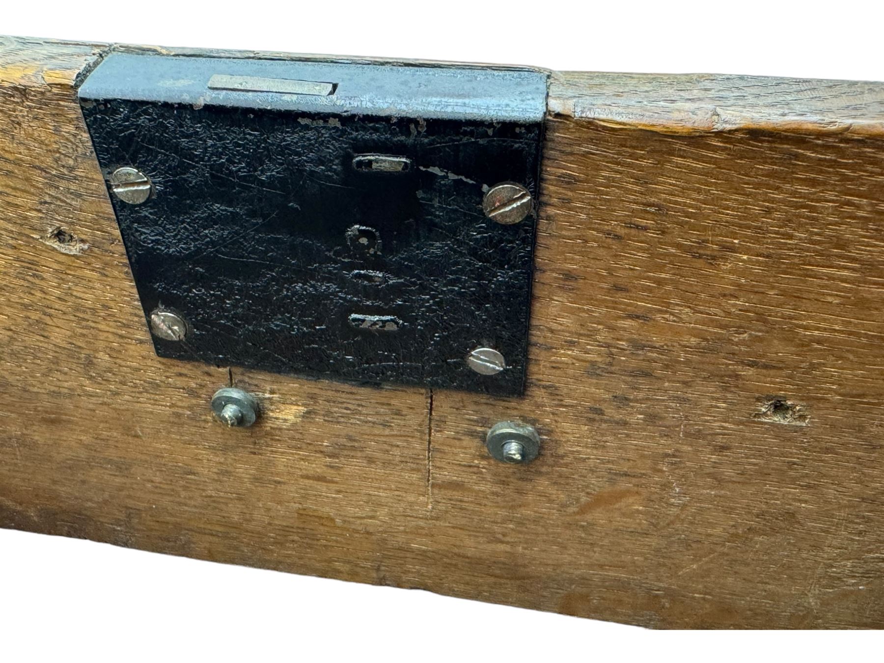 Victorian carved oak kneehole desk, the rectangular top with carved edge, above central drawer with carved front and brass handles, central kneehole with cupboard door, flanked by two banks of three graduating drawers each with similarly carved decoration, on shaped plinth base with castors