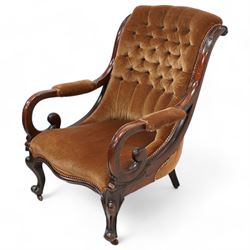 Victorian mahogany framed drawing room chair, scrolled back with bell-flower mouldings over scrolled arm terminals, upholstered in buttoned hazelnut brown fabric with sprung seat, cabriole supports on castors