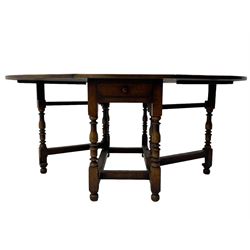 18th century oak dining table, oval drop-leaf top on gate-leg action base, turned supports united by turned stretchers, fitted with single end drawer