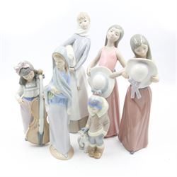 Five Lladro figures, including Girl with Straw hat no 5008, Girl with Hat no 5007, Eskimo Boy with Pet Polar Bear No.5238 etc, together with Nao figure