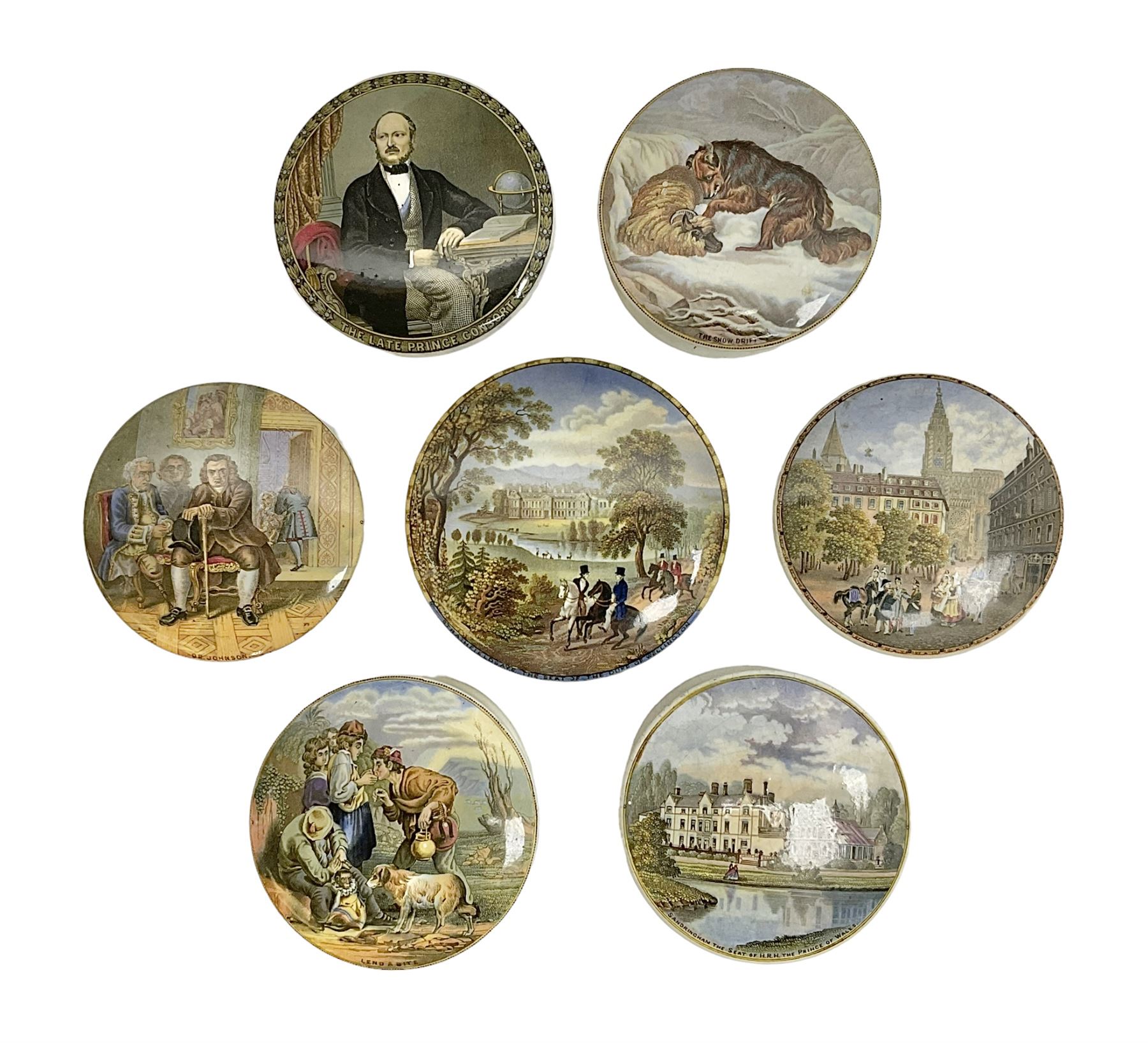 Seven 19th century Prattware pot lids with associated bases, including 'The Snow Drift', 'Strathfieldsaye The Seat of the Duke of Wellington', 'The Late Prince Consort', 'French Street Scene', Lend a Bite', 'Dr Johnson' and 'Sandringham the Seat of HRH The Prince of Wales', largest D12cm (7)