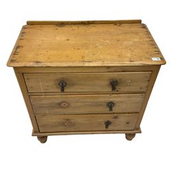 Victorian stripped pine chest, fitted with three drawers and raised on turned feet