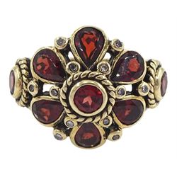 9ct gold garnet and diamond flower head cluster ring, Birmingham 2002 